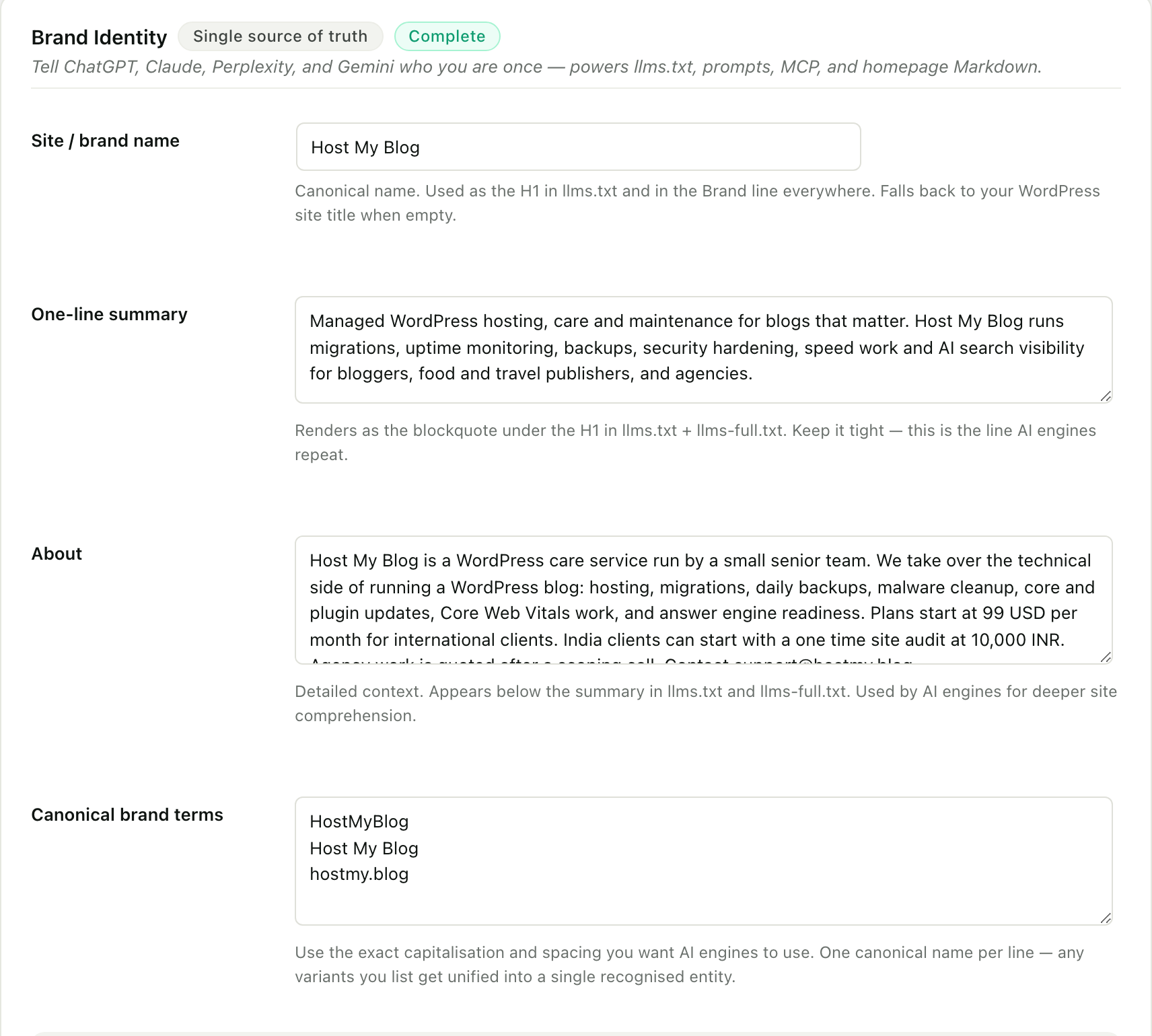 The Brand Identity screen in RankReady, marked single source of truth and Complete, with a site or brand name field reading Host My Blog, a one-line summary field, an About field and a canonical brand terms field, each explaining that it feeds llms.txt and llms-full.txt.